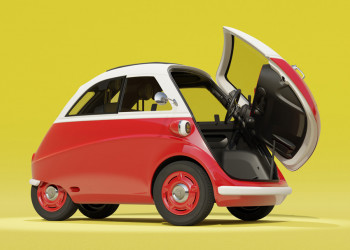 Une voiturette biplace électrique affichant une autonomie de 200 km en approche