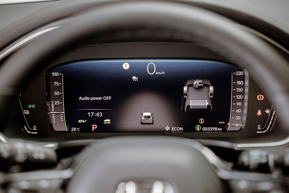 La Honda Civic hybride cinq portes se singularise par une ligne de toit plongeante
