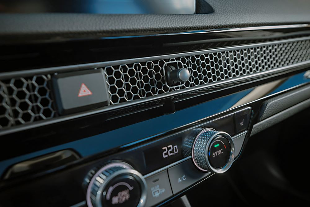 La Honda Civic hybride cinq portes se singularise par une ligne de toit plongeante