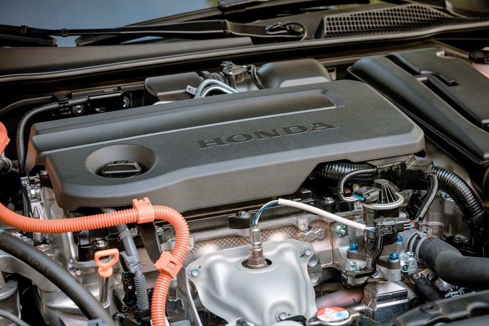 La Honda Civic hybride cinq portes se singularise par une ligne de toit plongeante